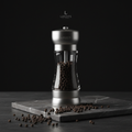 Black Peppercorn Grinder on dark marble surface
