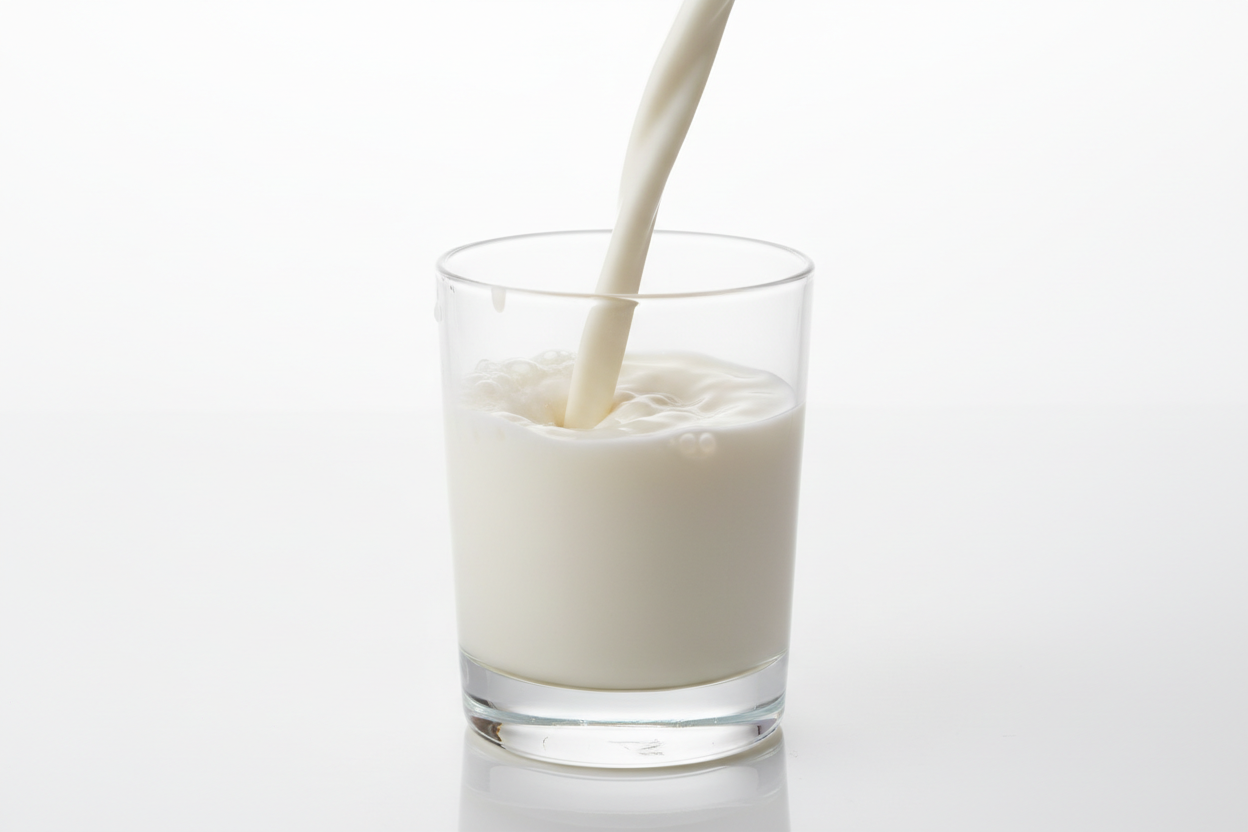 Fresh Goat Milk Being Poured