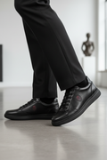 Black Snake Material Sneaker - Lifestyle Promotional Image
