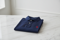 Navy Blue Polo Shirt - Studio Banner