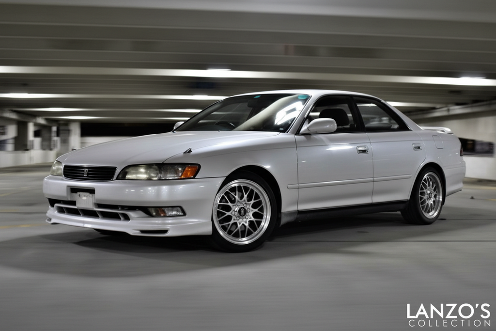 JZX100 with chrome wheels installed - parking garage lifestyle shot